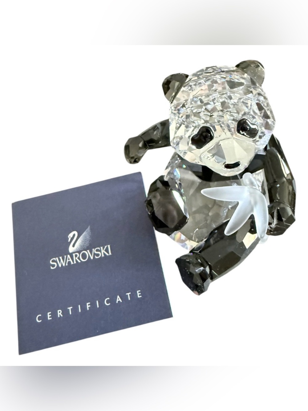This figurine is the Swarovski SCS clear & black Panda Cub chewing on bamboo - Picture 2 of 2